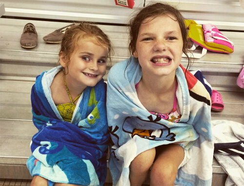 Campers drying off after a fun swim in the pool at the Webster Aquatics Center
