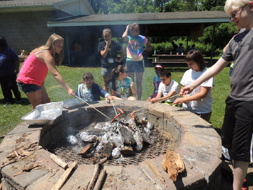 Survivor! Cooking over an open fire.