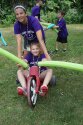 Camper riding tricycle