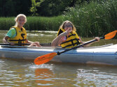 Young campers kayaking.