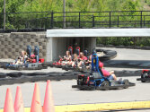 Campers enjoying a go-kart race.