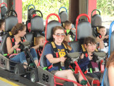 Young camper ready for a go-kart race.