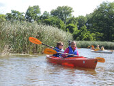 Young campers kayaking.
