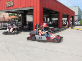 Campers enjoying a go-kart race.