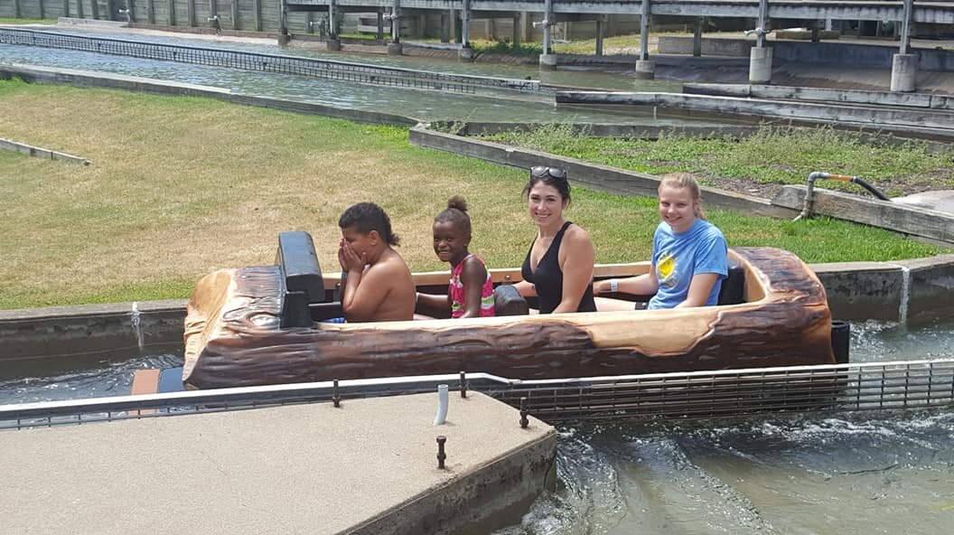 Campers enjoying a log ride.