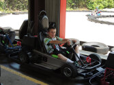Young camper ready for a go-kart race.