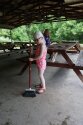 Camper sweeping on patio