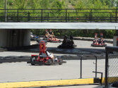 Campers enjoying a go-kart race.