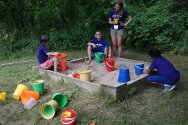 Campers playing in the sandbox