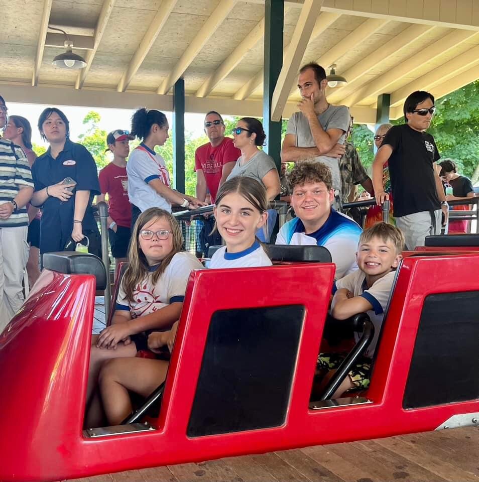 Campers enjoying a merry-go-round.