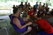 Mother Jane reading a Native American story to our campers