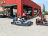 Campers enjoying a go-kart race.