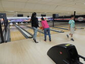 Camper using a ramp to bowl