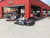 Campers enjoying a go-kart race.